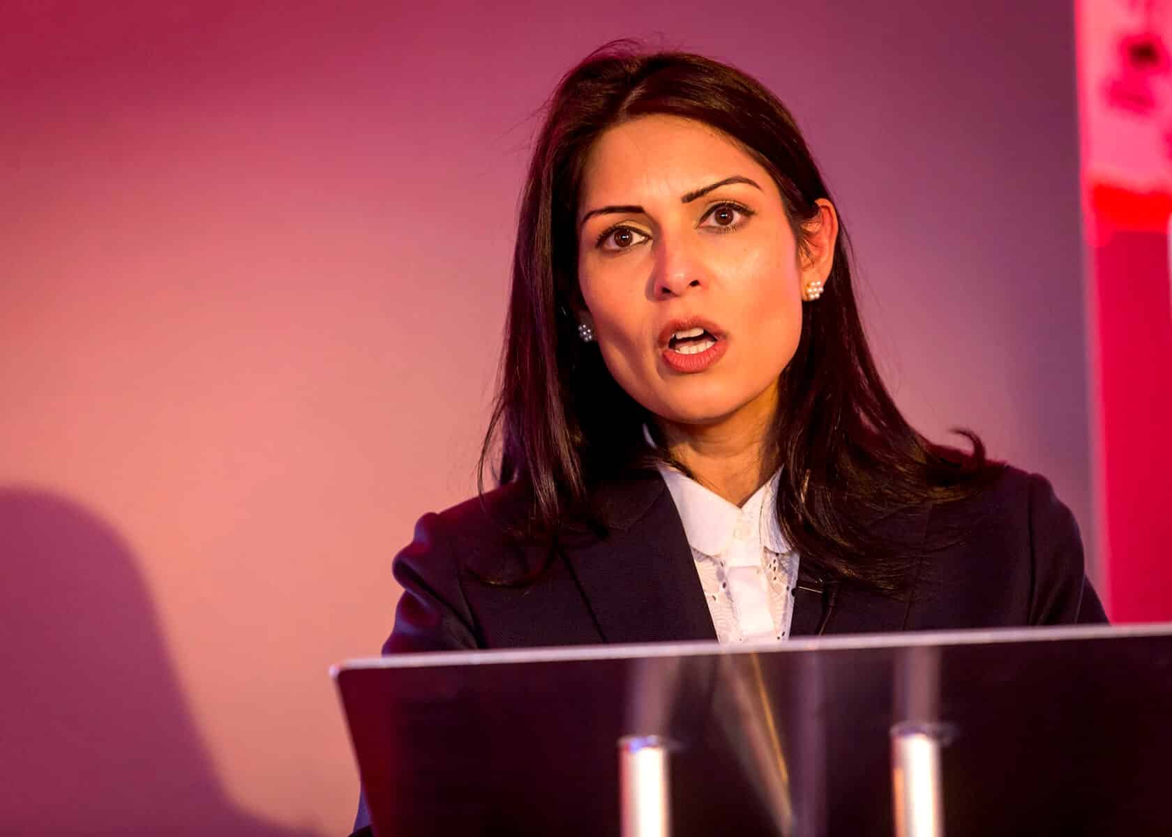 Woman speaking at a conference podium